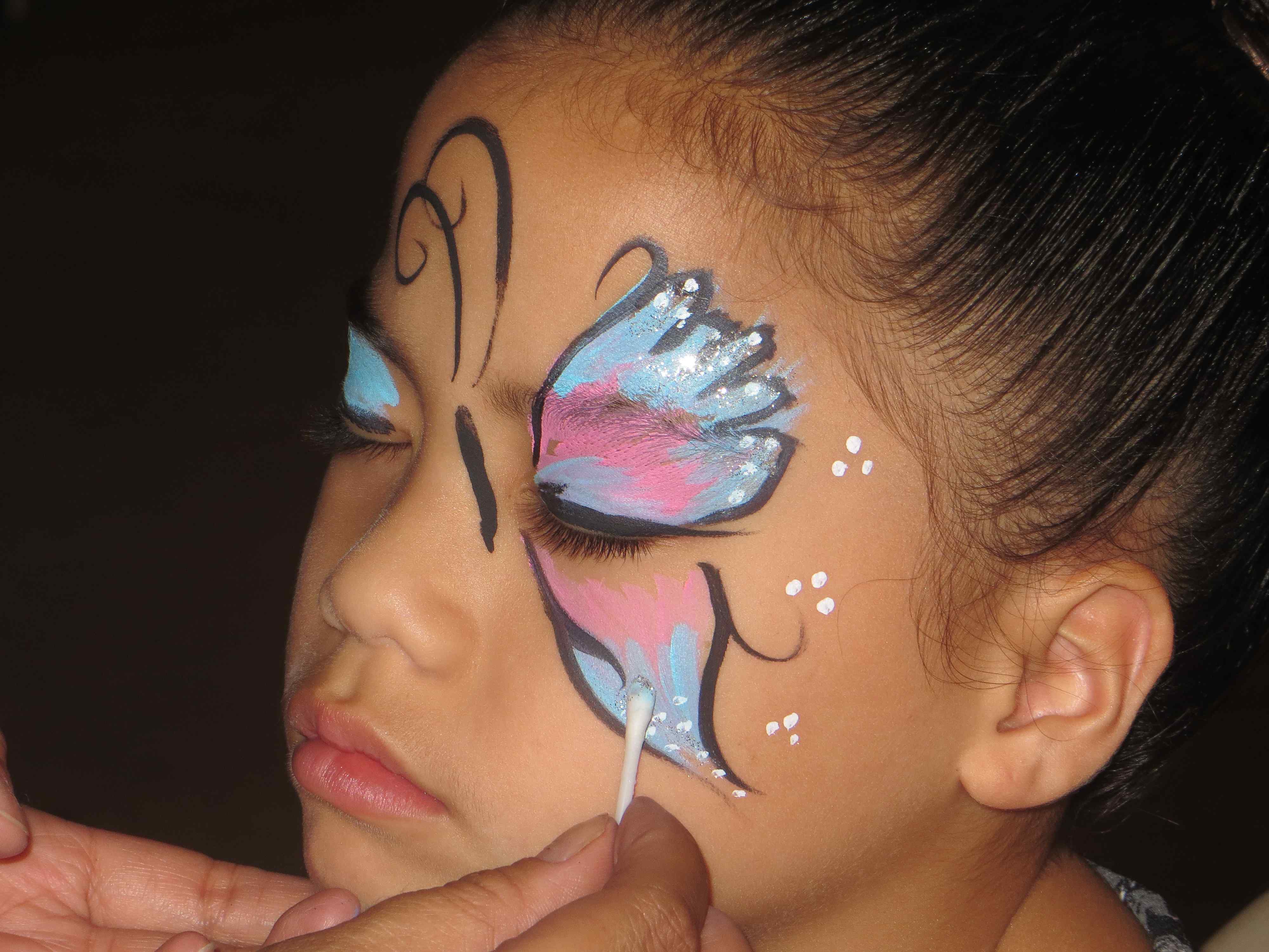 Beautiful butterfly face paint design